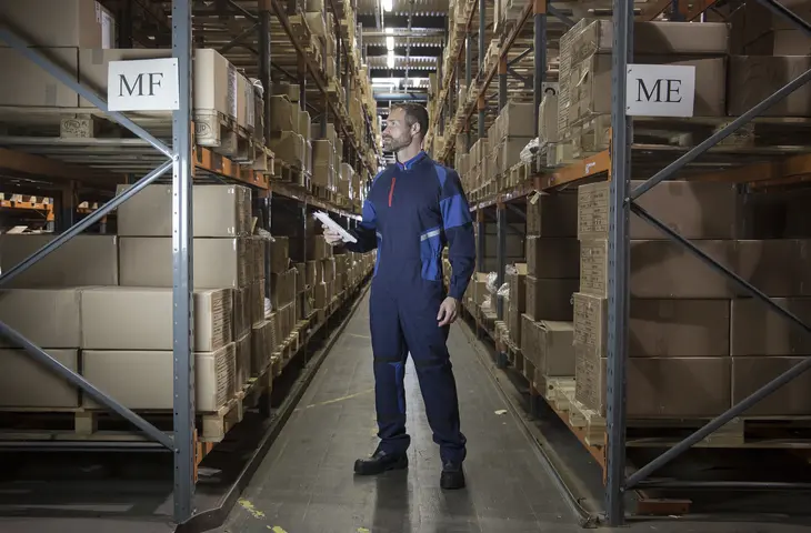 A man wearing a blue Arrow coverall